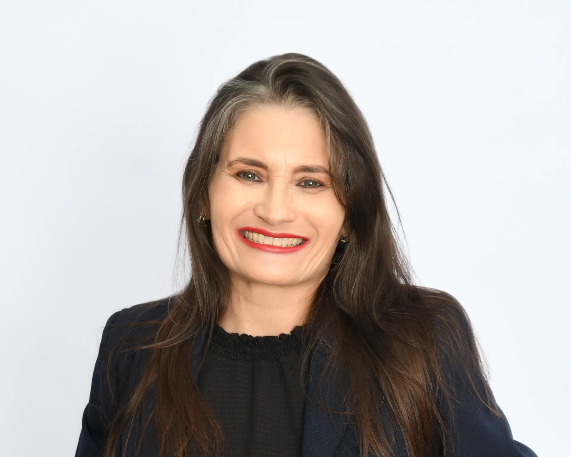 Patrícia Brito, corretora da B2PROTEGE, sorrindo